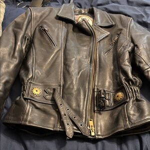 Women's Classic Black Leather Jacket with Buckle Detail